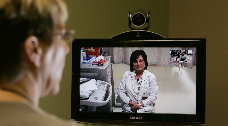 Dayton-area medical providers are scrambling to find ways to care for patients without putting them at risk of catching the coronavirus. For some local doctors, that means moving appointments out of the office and onto the internet.