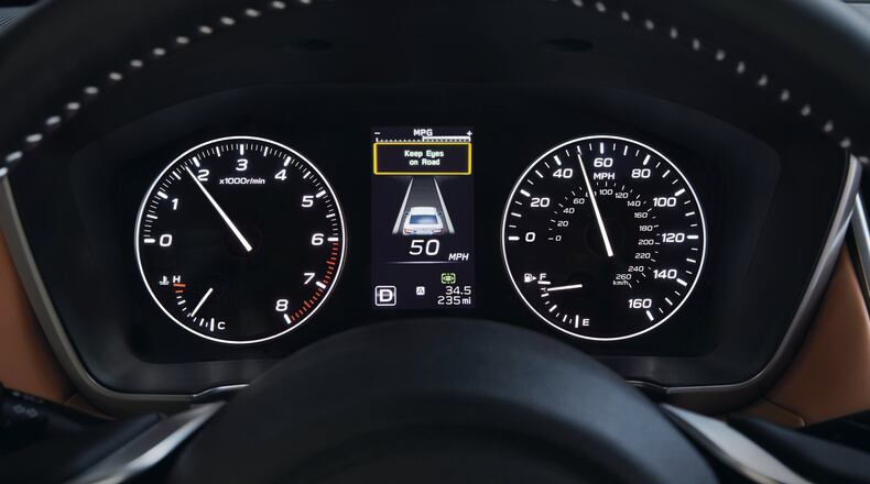 This undated image provided by Subaru shows Subaru’s DriverFocus Distraction Mitigation System. The system uses a dashboard camera to watch the driver s eyes and face. If it sees the driver is looking away from in front of the vehicle for an extended period, it will beep and the message ‘Keep eyes on road’ will show on the dashboard. The system watches for heads nodding or someone talking on the phone or texting, or even looking into the back seat, said Subaru spokesman Ron Kiino. TOSHI OKU / SUBARU OF AMERICA