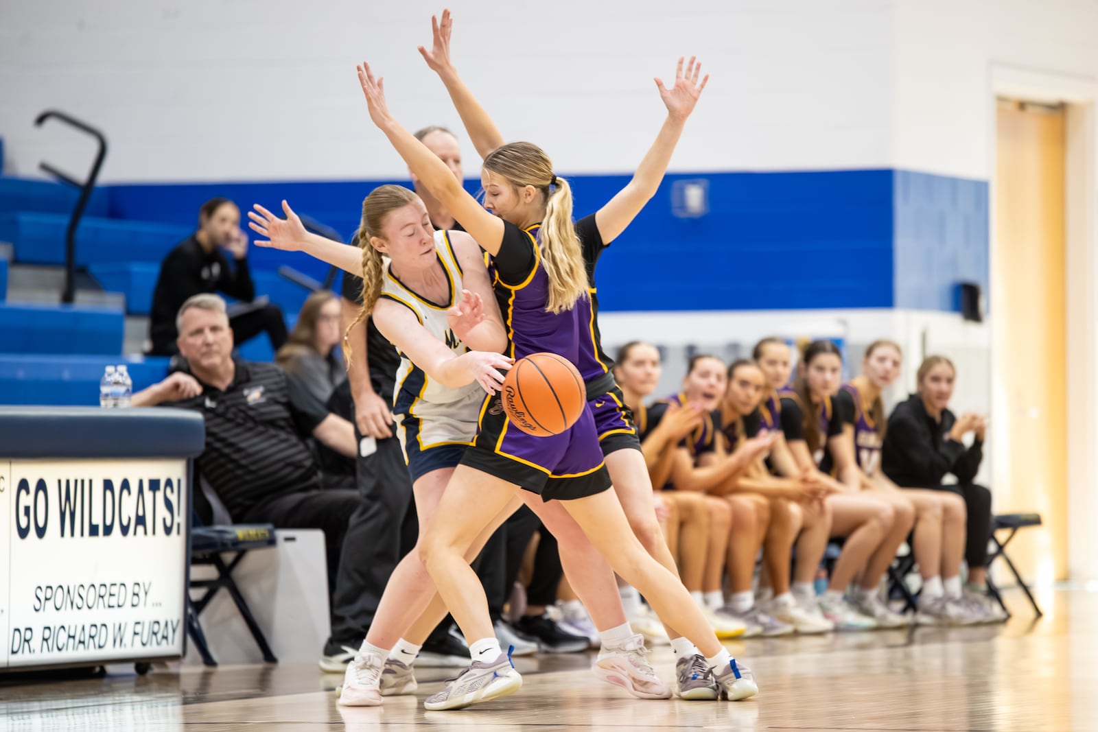 Carroll beat Goshen and Bellbrook beat Monroe to win Division III district titles on Saturday, Feb. 28, 2026 at Springfield High School. MICHAEL COOPER / STAFF