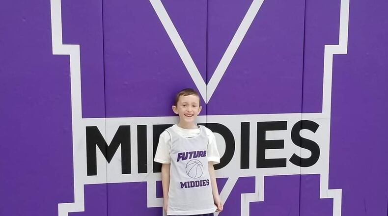 Michael Lawson, a second grader at Wildwood Elementary School in Middletown, had his 8th birthday party plans changed twice by the coronavirus. His parents are throwing him a birthday party parade at 6 p.m. Saturday outside his house on Bexley Drive. This basketball season he played for the Future Middies and was coached by Maj. Malcolm Tipton. SUBMITTED