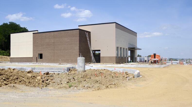 Construction on a new Panera Bread at 5875 Dixie Highway in Fairfield started last month. The restaurant is expected to be completed sometime in early 2021. The store will be in front of Shared Harvest Foodbank, which sold part of its land on Ohio 4 for development. MICHAEL D. PITMAN/STAFF