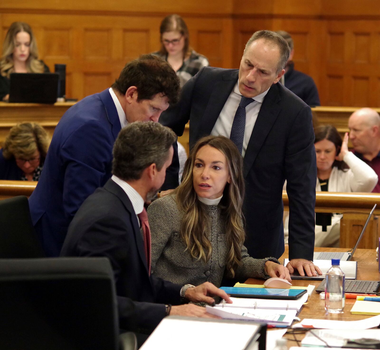 Karen Read talks with her attorneys during her trial at Norfolk Superior Court in Dedham, Mass., Friday, May 2, 2025. (Mark Jarret Chavous/The Enterprise via AP, Pool)