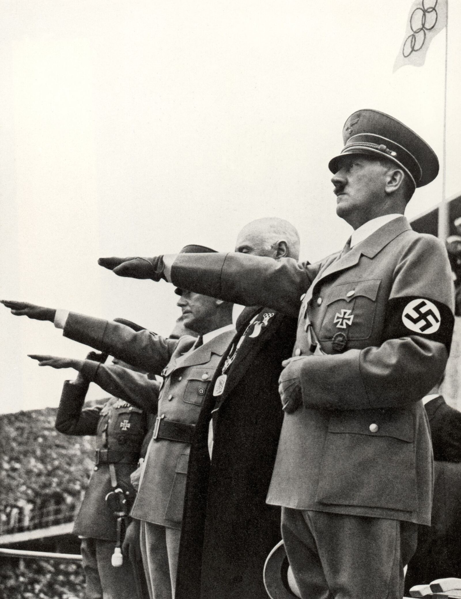 Adolf Hitler and his staff salute the teams during the opening ceremonies of the XI Olympic Games on August 1, 1936 in Berlin, Germany.
