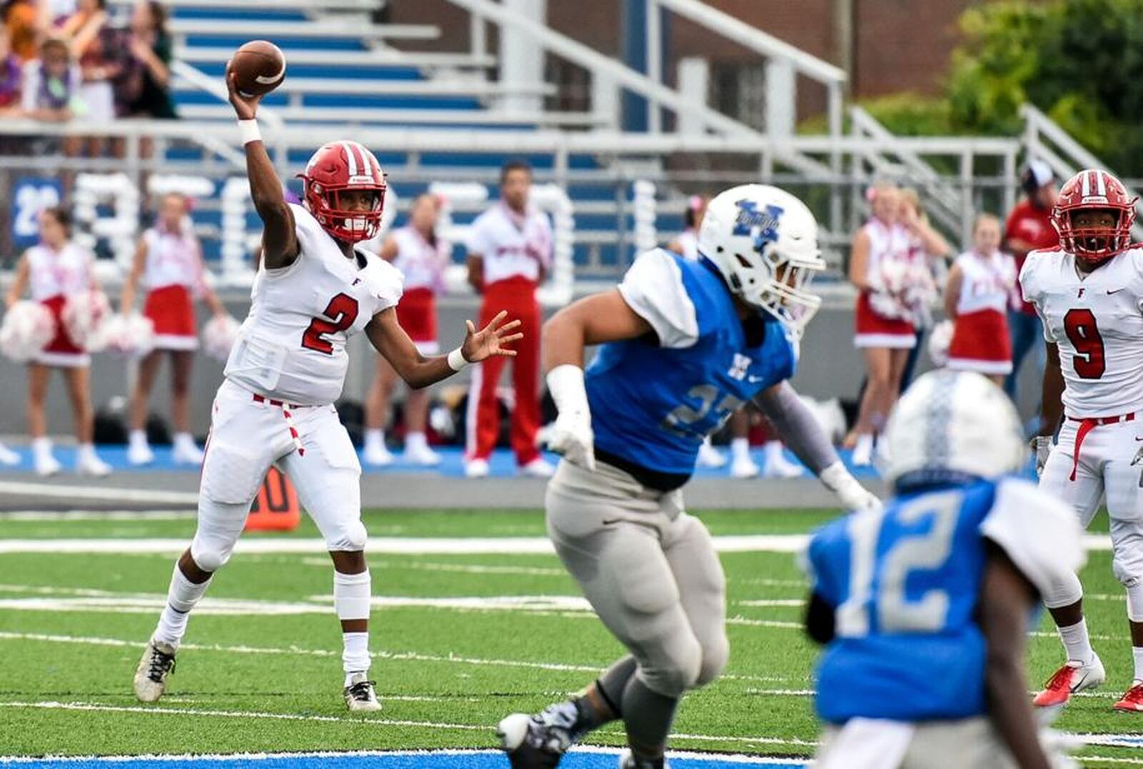 Fairfield’s Sawiaha Ellis (2) delivers a pass during last Friday’s 40-6 victory over Hamilton at Virgil Schwarm Stadium in Hamilton. NICK GRAHAM/STAFF