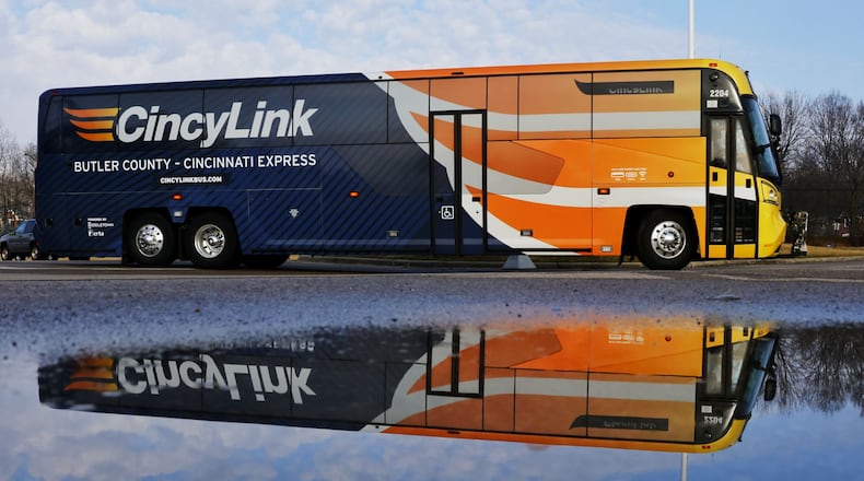 Pictured is a Butler County Regional Transit Authority CincyLink bus earlier this year at the Middletown Meijer. The bus has routes to and from Greater Cincinnati, as well as stops in West Chester Twp., and Hamilton, that opens up scores of thousands of jobs for people in Butler County. NICK GRAHAM/STAFF