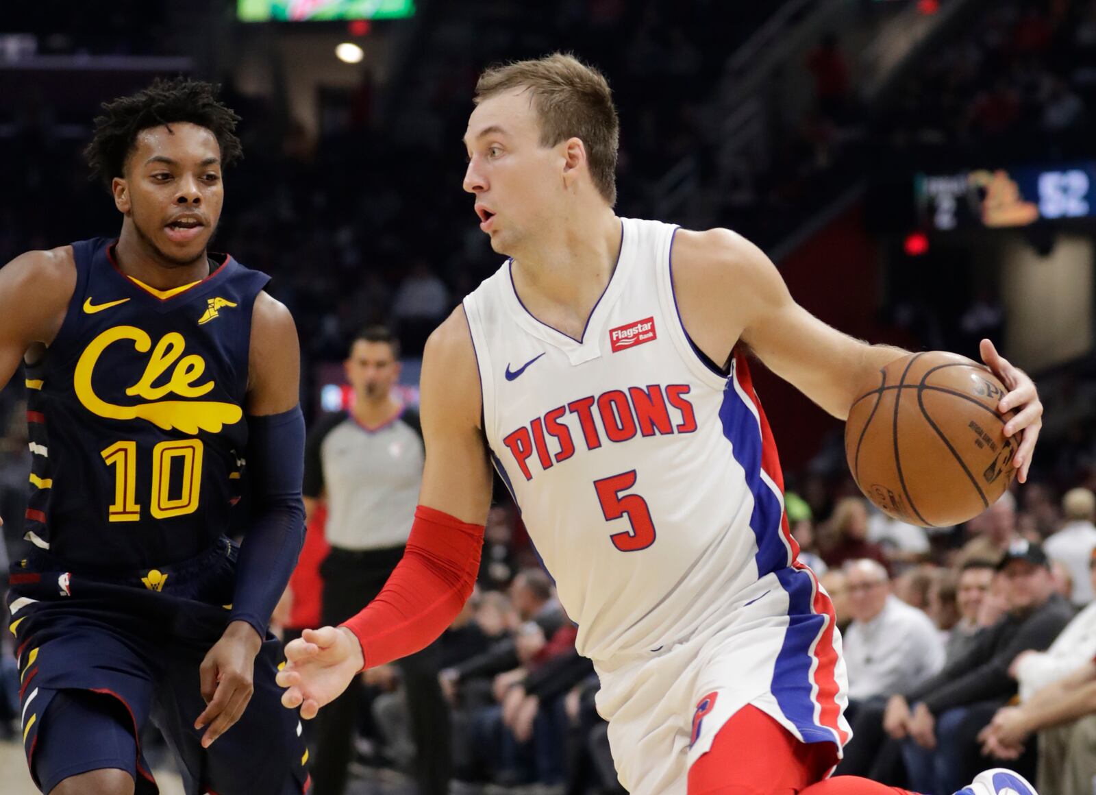 FILE - In this Dec. 3, 2019, file photo, Detroit Pistons' Luke Kennard (5) drives against Cleveland Cavaliers' Darius Garland (10) during the second half of an NBA basketball game in Cleveland. The Los Angeles Clippers acquired  Kennard from Detroit as part of a three-way deal with the Pistons and Brooklyn on Wednesday, Nov. 18, 2020. (AP Photo/Tony Dejak, File)