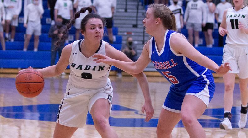 Badin junior Mahya Lindesmith is guarded by Carroll's Charlotte Ruble in the first half Friday night in the Rams' 45-41 loss to Carroll in the Division II regional final at Springfield High School. Jeff Gilbert/CONTRIBUTED