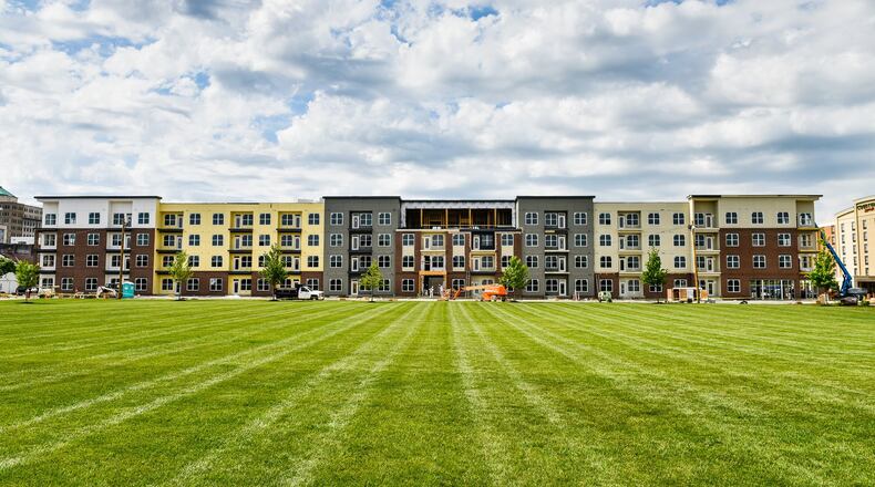 Construction continues on The Marcum, a mixed use project that includes residential and retail space in Hamilton. NICK GRAHAM/STAFF