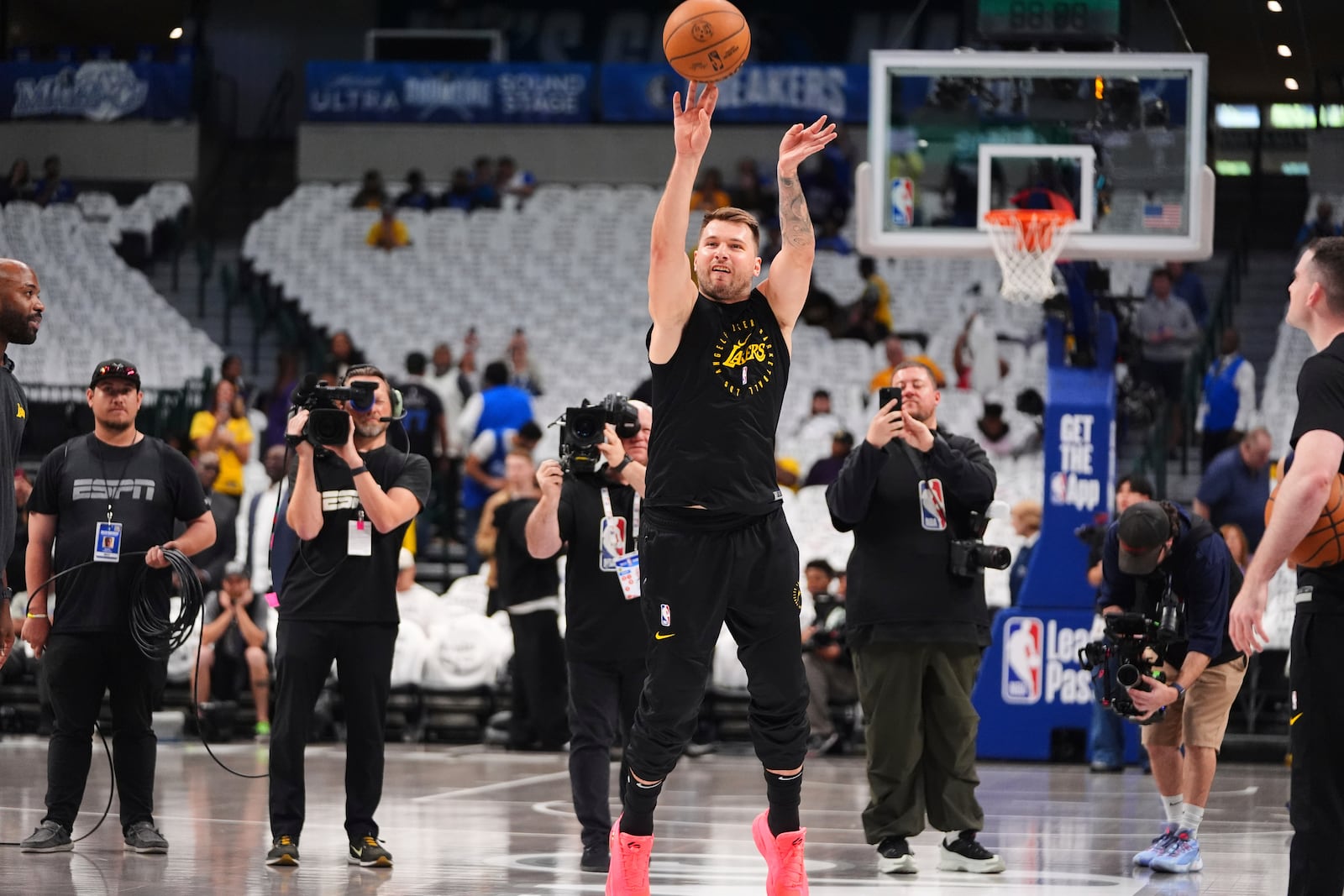 Los Angeles Lakers' Luka Doncic warms up before an NBA basketball game against the Dallas Mavericks in Dallas, Wednesday, April 9, 2025. (AP Photo/LM Otero)