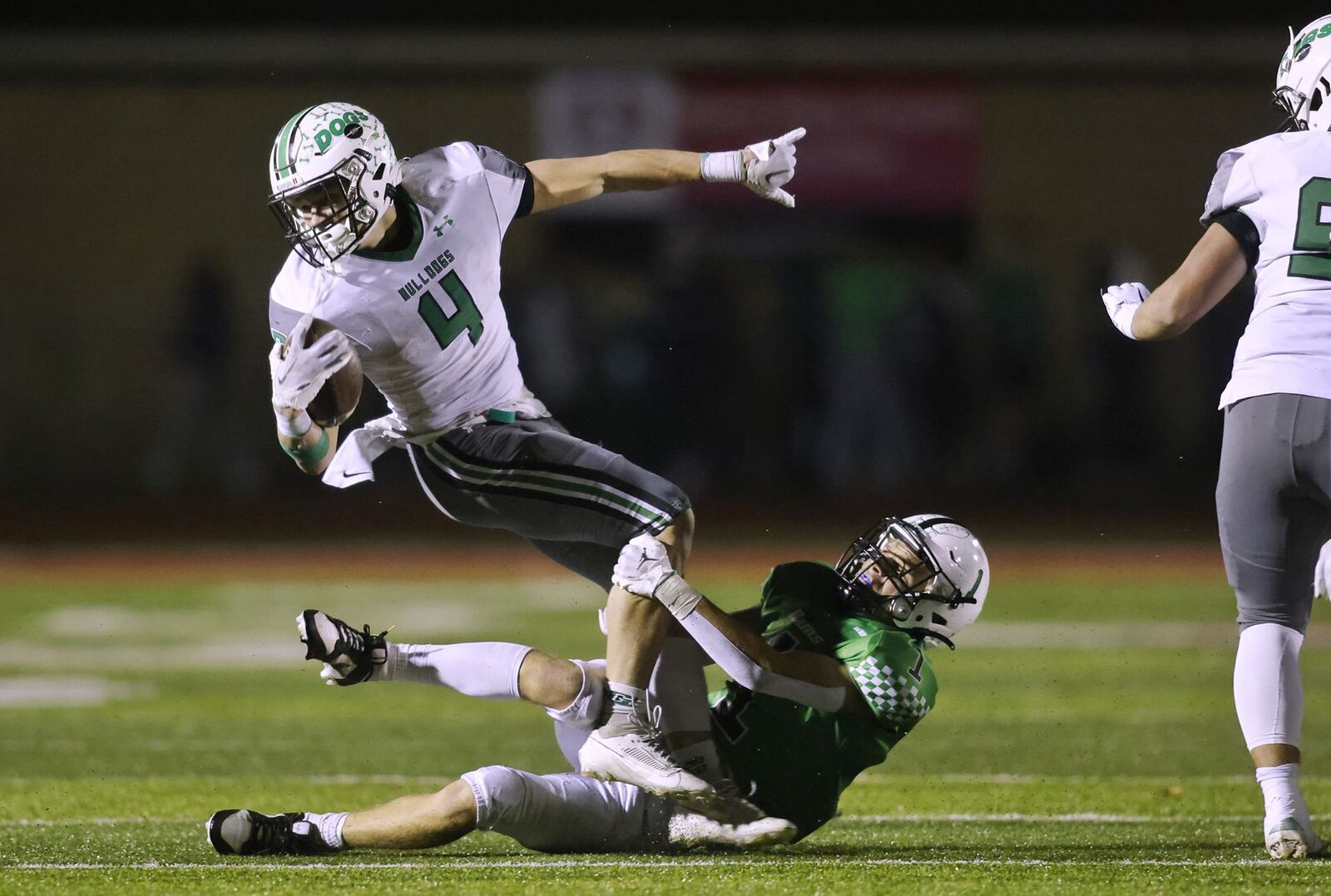 Celina's Braylon Gabes is tackled by Badin's Aidan Brown during their D-III regional football final Friday, Nov. 17, 2023 at Trotwood-Madison High School. Celina won 37-25. NICK GRAHAM/STAFF