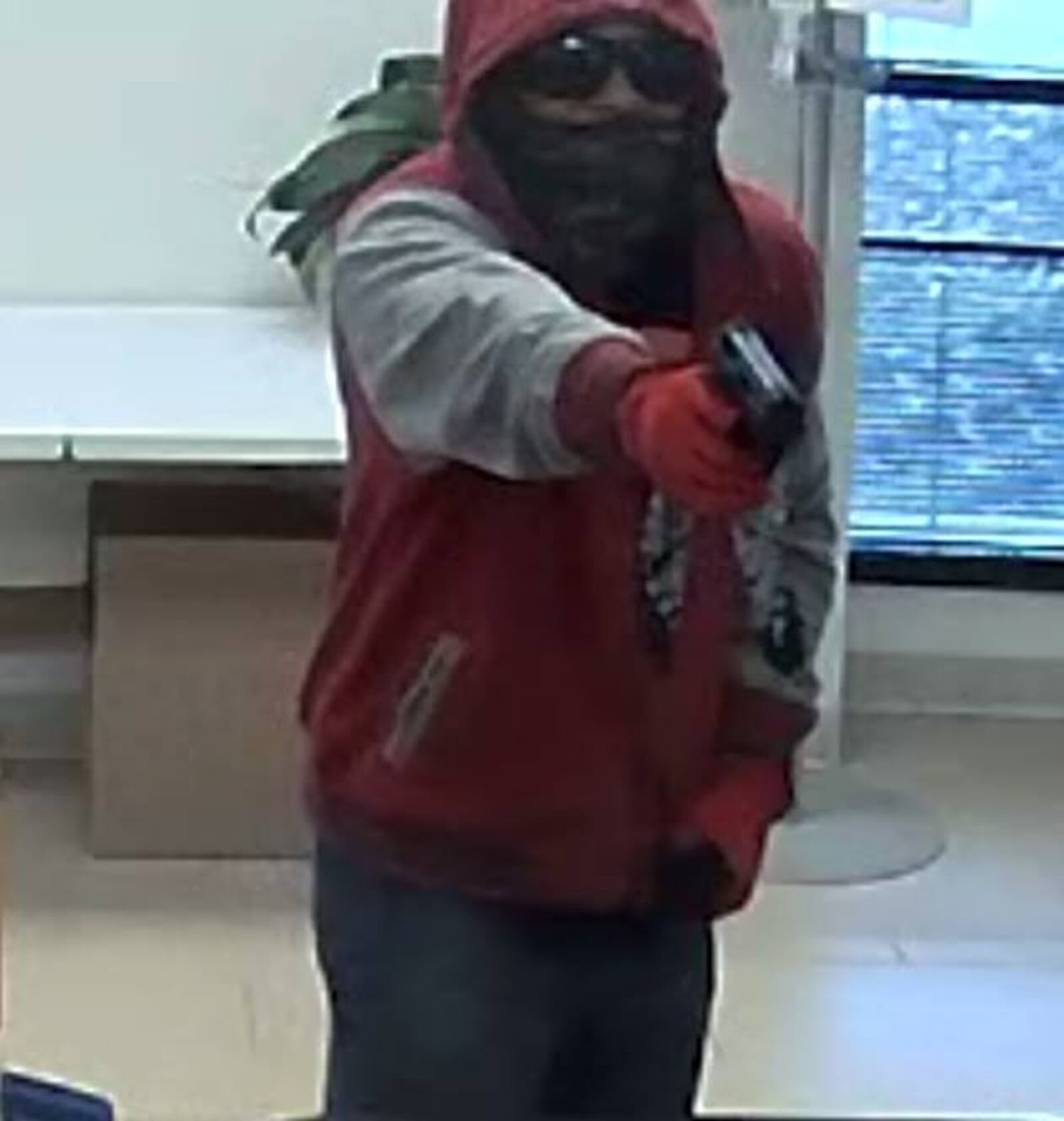 A bank robber, described as a light-skinned black male by witnesses, stole an undisclosed amount of cash from First Financial Bank on South Gilmore Road in Fairfield.