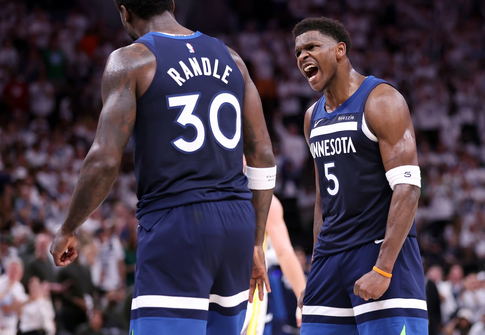 Minnesota Timberwolves' Anthony Edwards celebrates a basket and a foul for Julius Randle in 2nd quarter in NBA Western Conference Semifinals' Game 5 at Target Center in Minneapolis on Wednesday, May 14, 2025.(Scott Strazzante/San Francisco Chronicle via AP)