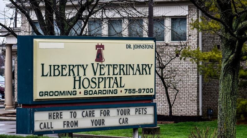 Liberty Veterinary Hospital on Yankee Road in Liberty Twp. is still offering pet care services during the novel coronavirus (COVID-19) pandemic, but they are coming to client’s cars to get animals for service instead of letting pet owners inside the building. NICK GRAHAM/STAFF