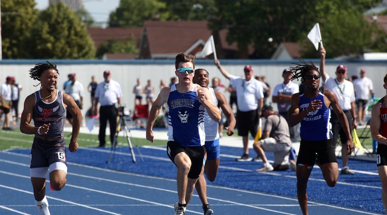 Brookville's Coy Hyre races to victory in the 100-meter dash in the OHSAA Division II state track and field championships on Saturday, June 1, 2024, at Welcome Stadium in Dayton. David Jablonski/Staff