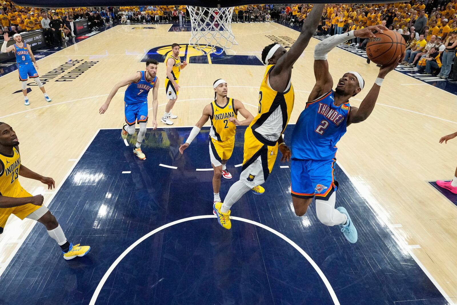 Oklahoma City Thunder guard Shai Gilgeous-Alexander (2) drives to the basket against Indiana Pacers forward Pascal Siakam (43) during the second half during the first half of Game 6 of the NBA Finals basketball series, Thursday, June 19, 2025, in Oklahoma City. (Kyle Terada/Pool Photo via AP)