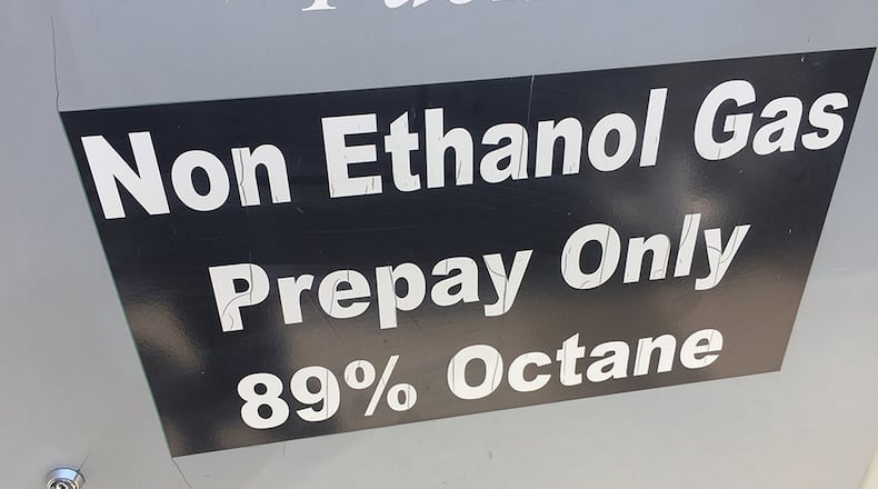 A gas pump located away from the main pumps is labeled to be ethanol free. Ethanol is more expensive than regular gasoline. James Halderman photo