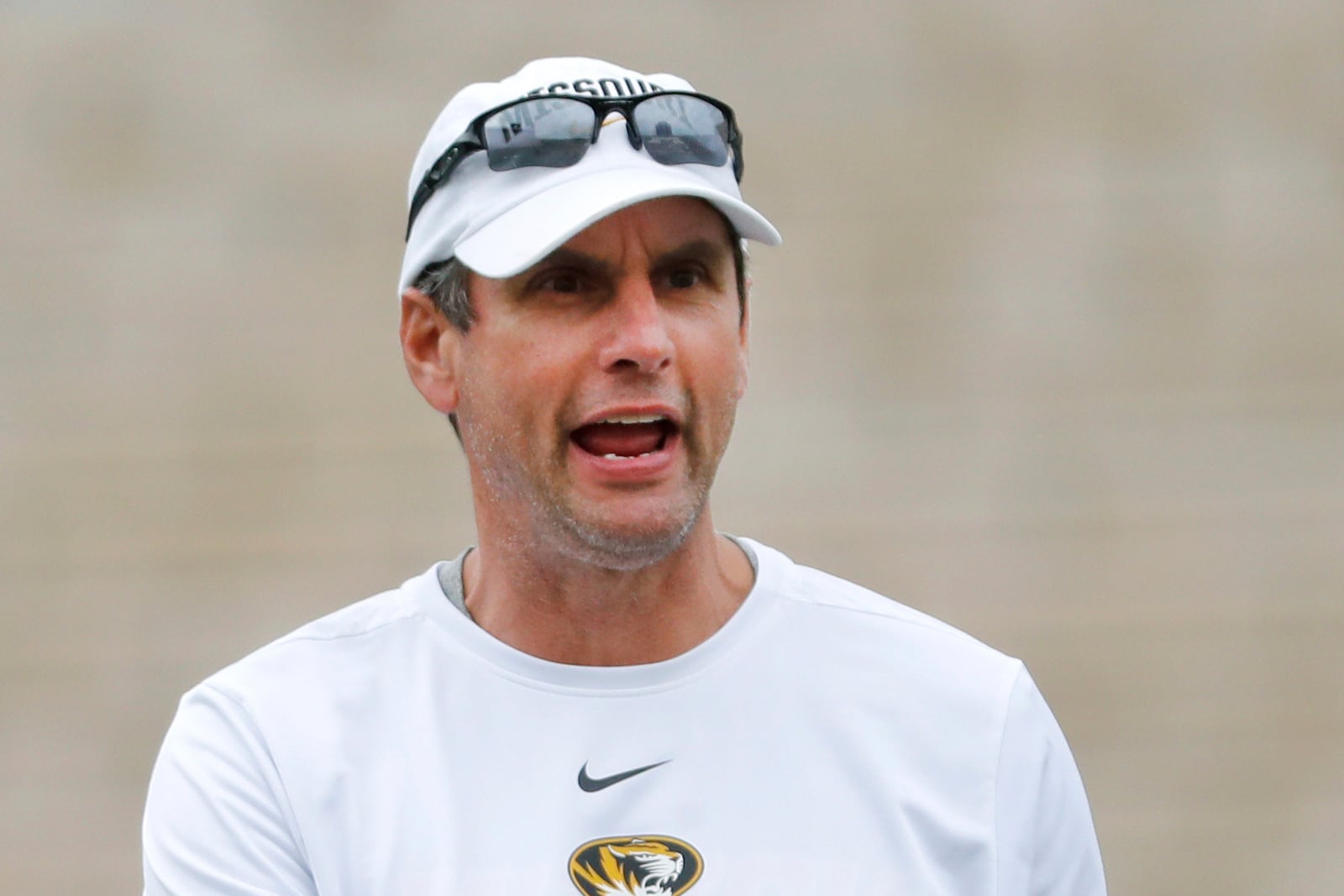 FILE - Missouri offensive coordinator Derek Dooley calls out instructions during an NCAA college football practice, Aug. 12, 2019, in Columbia, Mo. (AP Photo/Jeff Roberson, File)