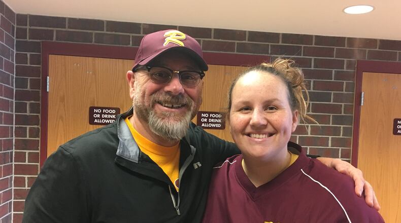 Former Ross High School softball coach Paul Fernandez poses with his replacement, Anna Winters, at the school this week. RICK CASSANO/STAFF
