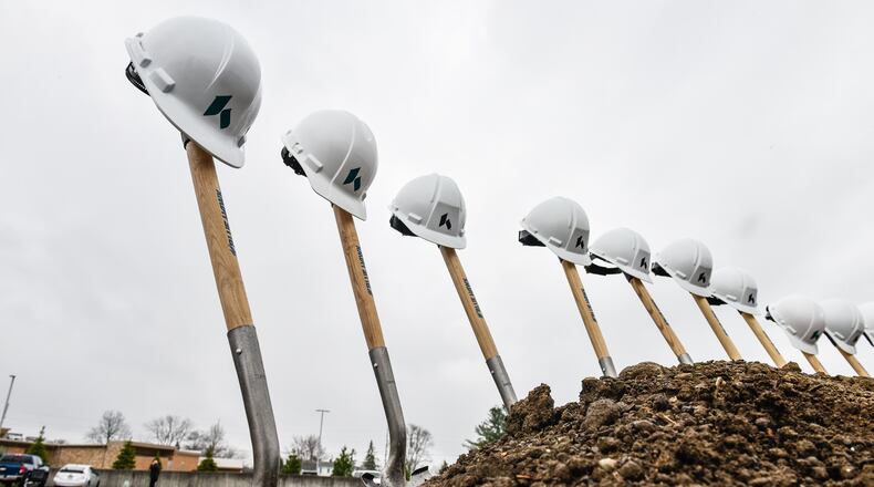 Kettering Health Network and Hamilton officials break ground on Hamilton Health Center on Main during a ceremony Monday, April 16 at the site of the former Skating on Main skating rink on Main Street in Hamilton. NICK GRAHAM/STAFF