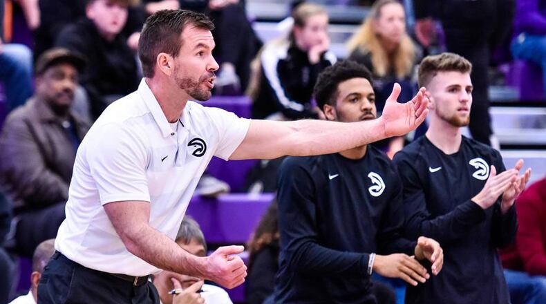 Lakota East coach Clint Adkins works the sideline as the Thunderhawks beat Middletown 61-47 in their basketball game Jan. 8, 2019, at Middletown’s Wade E. Miller Arena. On Tuesday, the Thunderhawks beat Oak Hills to clinch their second straight GMC title. NICK GRAHAM/STAFF