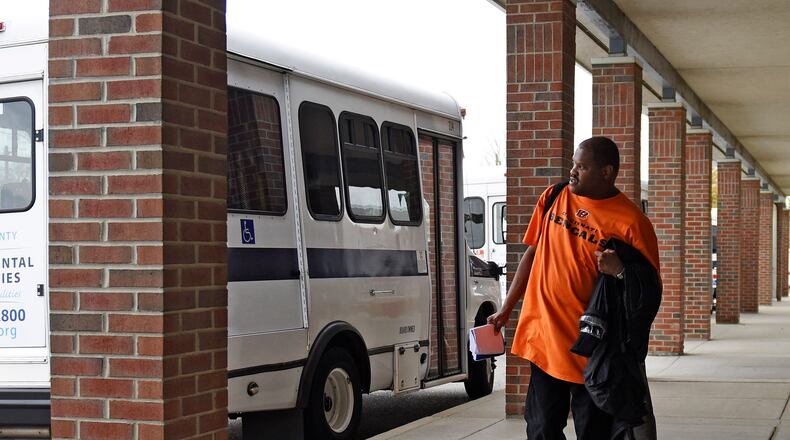 Daniel Heath gets on a Butler County Regional Transit Authority bus Nov. 5, 2015, after spending the day at Liberty Adult Center. Rules by a federal agency are resulting in the closure of the adult day care facility operated by the Butler County Board of Developmental Disabilities. NICK GRAHAM/STAFF