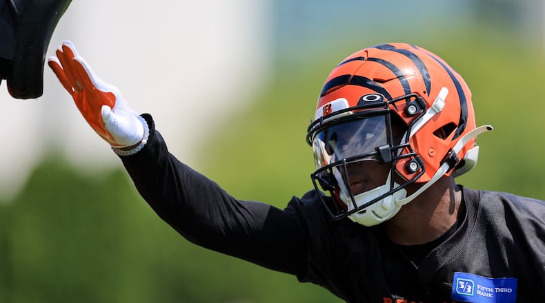 Cincinnati Bengals' Cam Taylor-Britt participates in a drill during a practice at the NFL football team's training facility in Cincinnati, Monday, Aug. 1, 2022. (AP Photo/Aaron Doster)