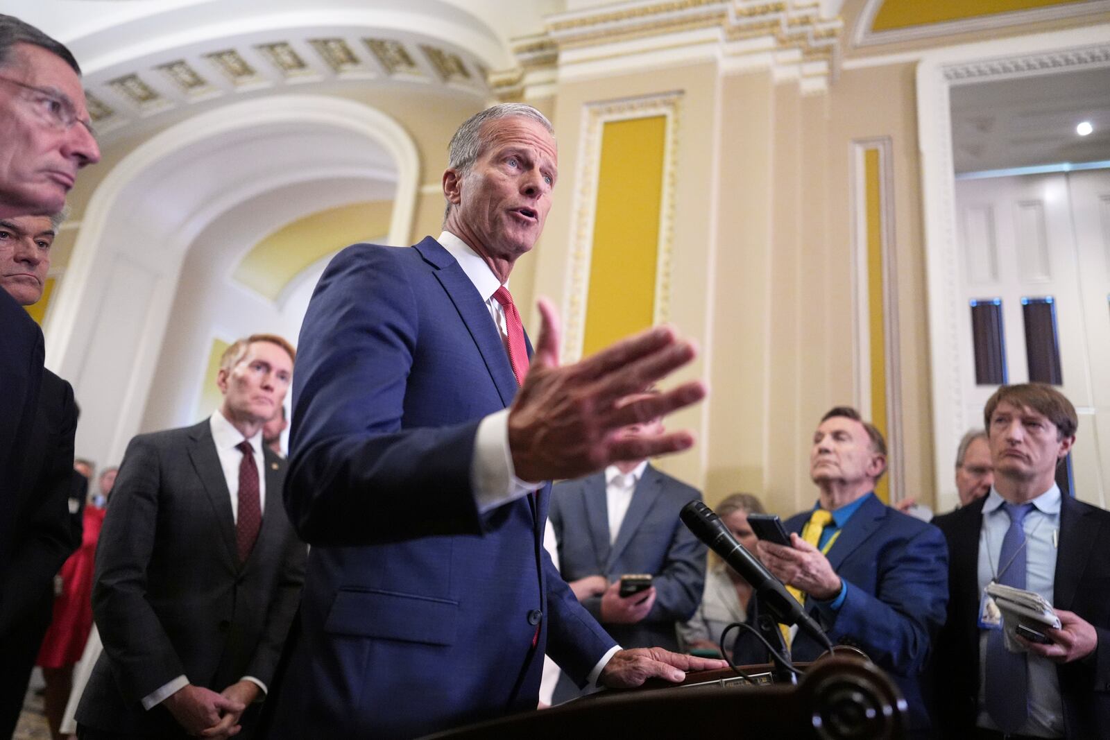 Senate Majority Leader John Thune, R-S.D., speaks to reporters following closed-door party meetings at the Capitol in Washington, Tuesday, June 17, 2025. (AP Photo/J. Scott Applewhite)