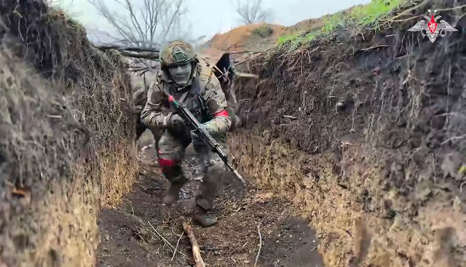 In this photo taken from video distributed by Russian Defense Ministry Press Service on Monday, April 14, 2025, Russian servicemen attend a combat training for assault units in an undisclosed location. (Russian Defense Ministry Press Service via AP)