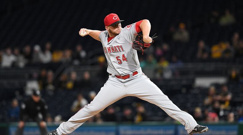 PITTSBURGH, PA - APRIL 11: Rookie Davis #54 of the Cincinnati Reds delivers a pitch in the first inning during the game against the Pittsburgh Pirates at PNC Park on April 11, 2017 in Pittsburgh, Pennsylvania. (Photo by Justin Berl/Getty Images)