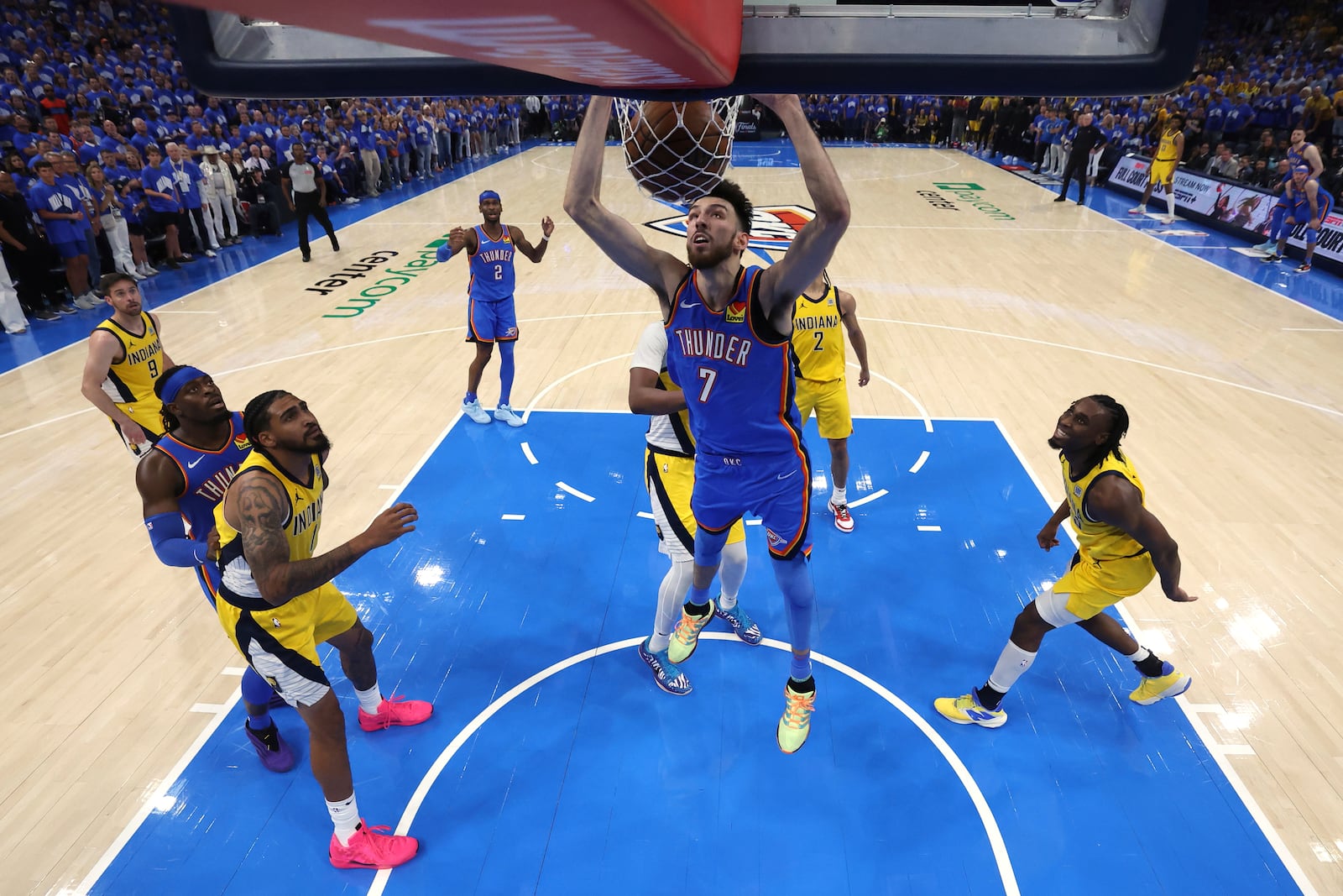 Oklahoma City Thunder forward Chet Holmgren (7) dunks against the Indiana Pacers during Game 7 of the NBA Finals basketball series Sunday, June 22, 2025, in Oklahoma City. (Matthew Stockman/Pool Photo via AP)