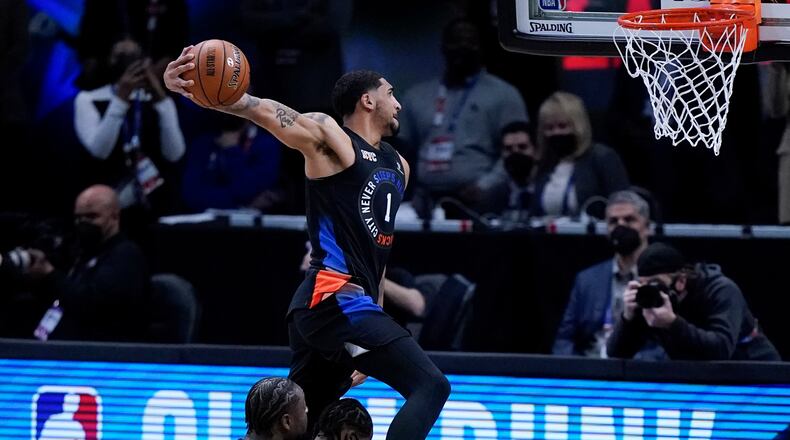 New York Knicks' Obi Toppin competes in the Slam Dunk contest during basketball's NBA All-Star Game in Atlanta, Sunday, March 7, 2021. (AP Photo/Brynn Anderson)