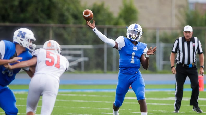 Hamilton quarterback Quincy Simms Marshall throws the football during their game against Anderson Friday, Sept. 6 at Virgil M. Schwarm Stadium in Hamilton. Big Blue won 28-14. NICK GRAHAM/STAFF