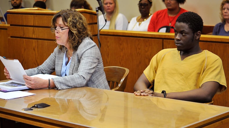 Michael Smith Jr., 17, will be tried as an adult in the shooting death of 19-year-old Shon Walker in Hamilton. Smith is pictured here in August during a hearing in a Butler Count juvenile courtroom. NICK GRAHAM/FILE
