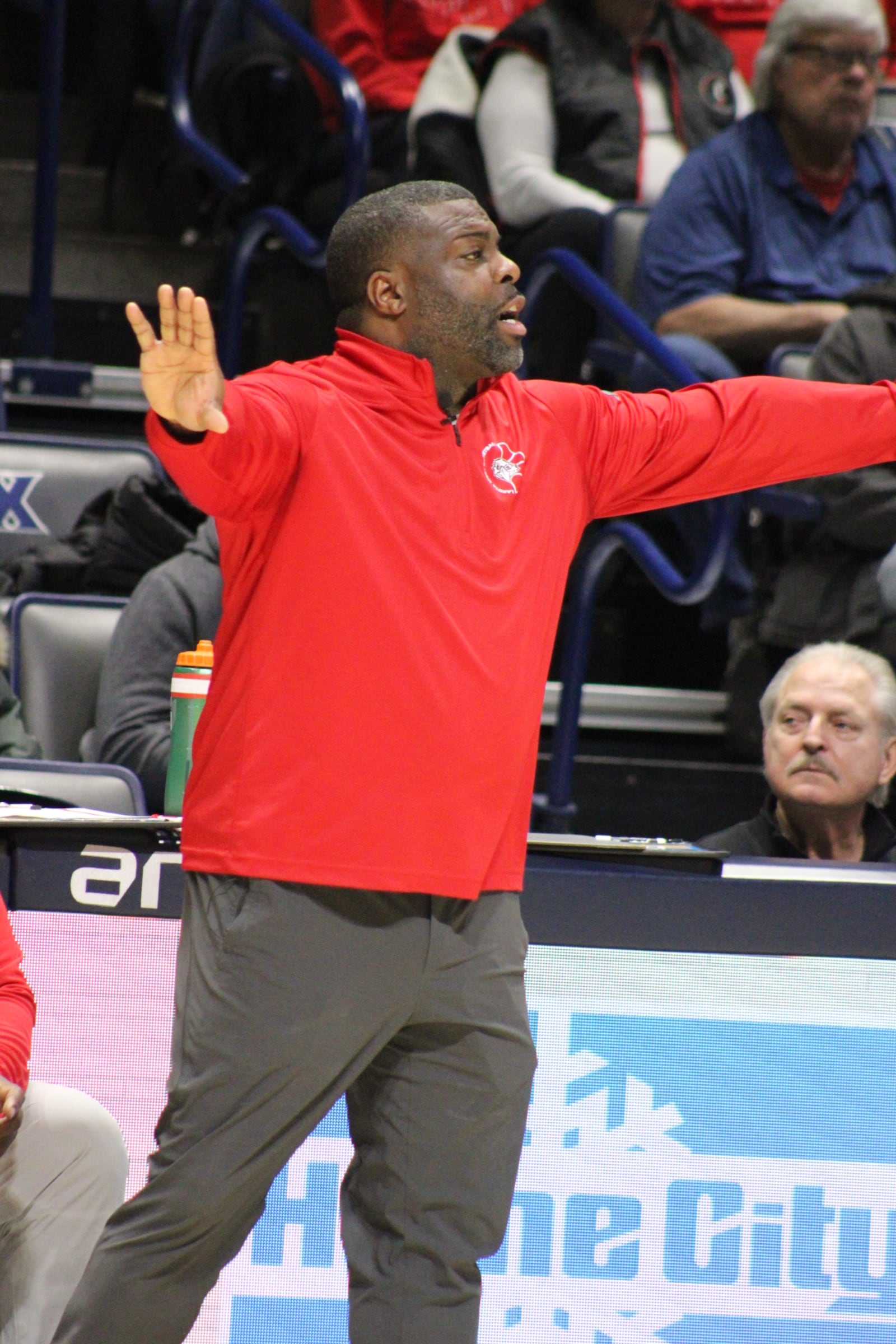 Lakota West coach Kelven Moss directs his team during a game against Hamilton at the Martin Luther King Classic on Monday, Jan. 19, 2026 at Xavier University’s Cintas Center. DIMITRIJE FISIC / CONTRIBUTED