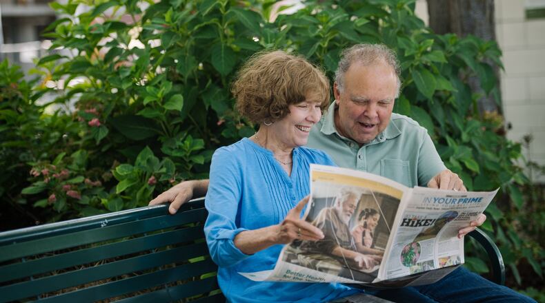 Barb and Joe are reading the In Your Prime special section of the paper.
