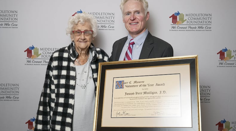 Mary Maurer presented Joe Mulligan with the volunteer of the year award named in her honor during the recent Middletown Community Foundation annual dinner. SUBMITTED PHOTO