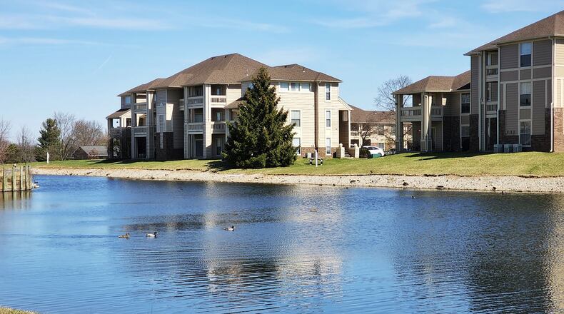 Alexander Enslen, who had been missing since Jan. 31, was found dead Saturday in a pond near Fountains Blvd. in West Chester Twp. A police officer has resigned after failing to investigate a report about a possible body in the pond a week prior. Nick Graham/STAFF