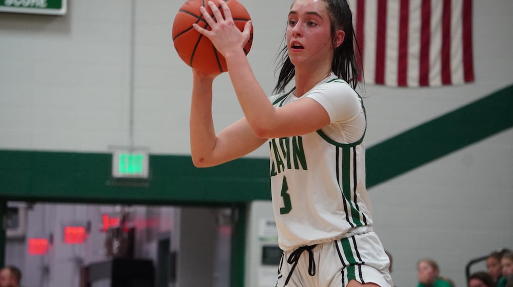 Badin’s Hailey Weber looks for a passing lane during her game against Fenwick on Tuesday at Mulcahey Gym. CHRIS VOGT / CONTRIBUTED