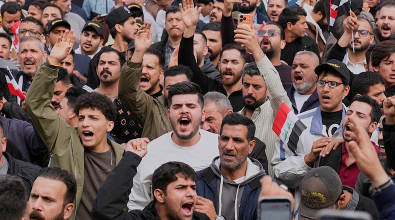 Iraqi traders protest against the imposition of customs duties on imported goods in Baghdad, Iraq, Sunday, Feb. 8, 2026. (AP Photo/Hadi Mizban)