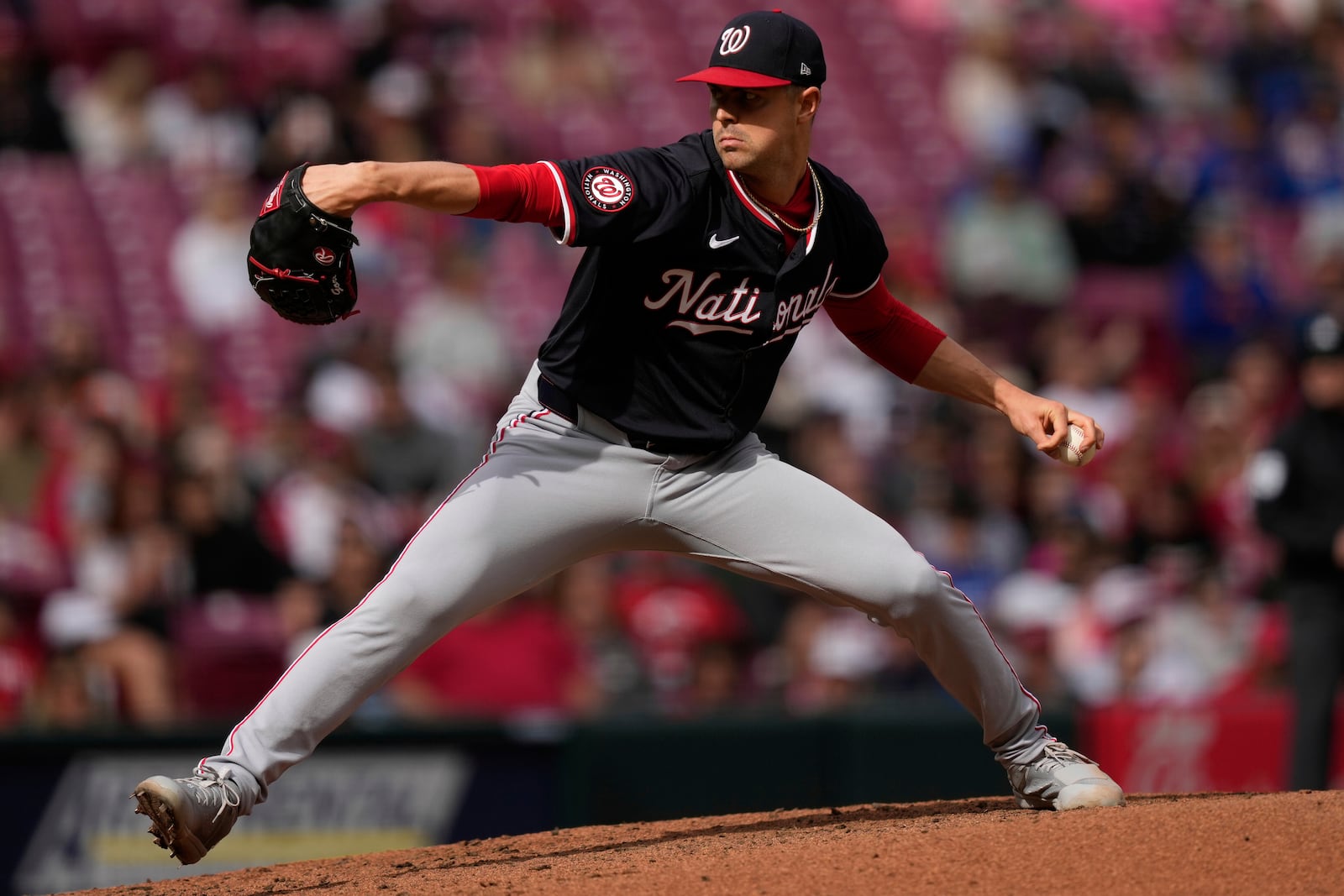 Washington Nationals pitcher MacKenzie Gore throws during the third inning of a baseball game against the Cincinnati Reds, Sunday, May 4, 2025, in Cincinnati. (AP Photo/Carolyn Kaster)