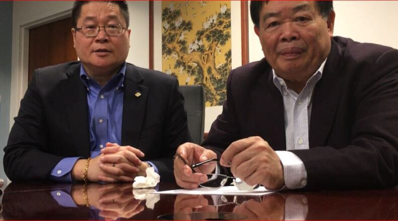 From left, Jeff Liu, president and chief executive of Fuyao Glass America, and Cho Tak Wong, chairman of Fuyao Global. THOMAS GNAU/STAFF