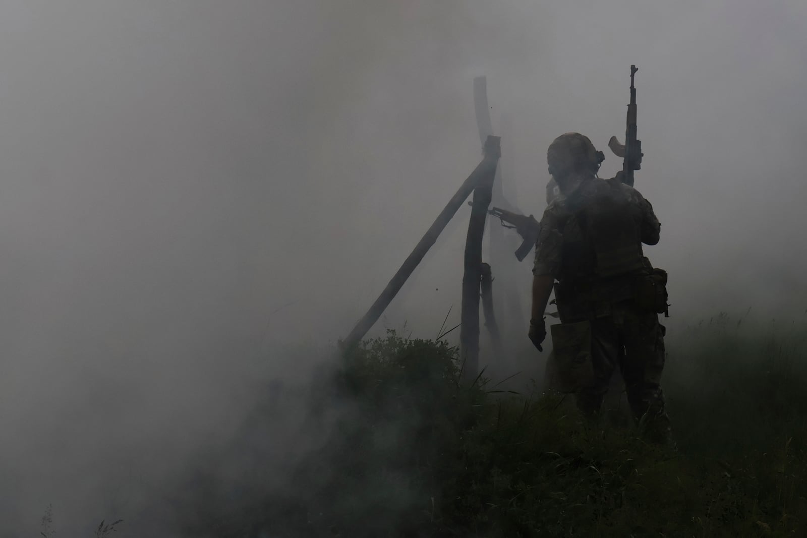 In this photo provided by Ukraine's 65th Mechanized Brigade press service, Ukrainian servicemen attend a military training in Zaporizhzhia region, Ukraine, Monday, May 26, 2025. (Andriy Andriyenko/Ukraine's 65th Mechanized Brigade via AP)