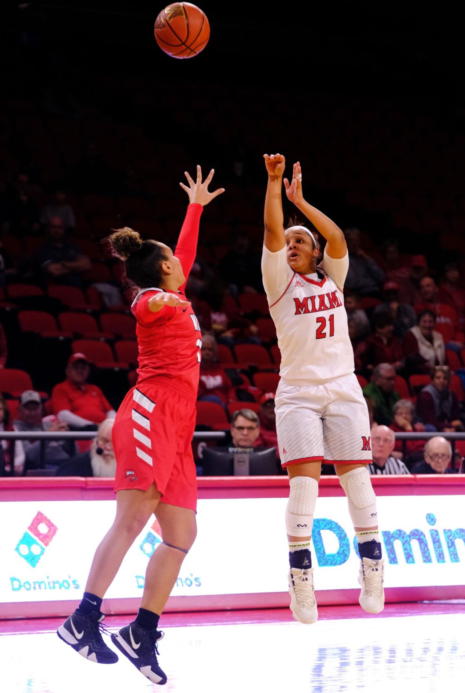 Miami University’s Leah Purvis (21) launches a shot Thursday night during a 67-63 WNIT loss to visiting Western Kentucky at Millett Hall in Oxford. SCOTT KISSELL/MIAMI UNIVERSITY