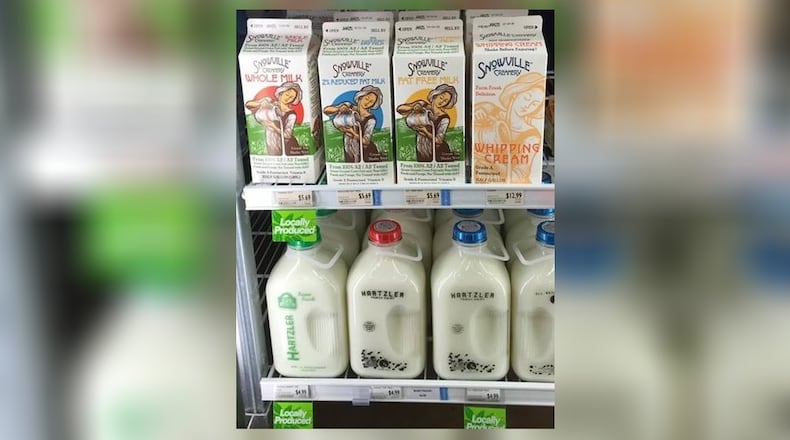 A case at MOON Co-Op in Oxford is stocked with milk options from local dairies. CONTRIBUTED