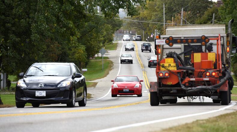 Motorists drive on Cincinnati-Dayton Road between West Chester Road and Interstate 75, a 1-mile stretch of road where improvements are planned to accommodate existing and projected traffic, reduce roadway congestion and improve motorist safety. NICK GRAHAM/STAFF