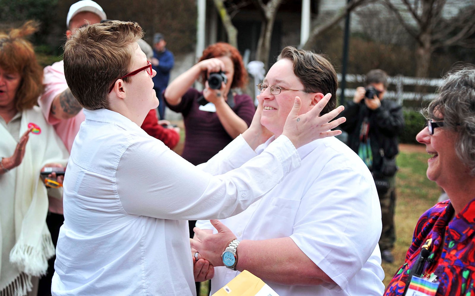 FILE - Same sex couples from Madison and surrounding counties celebrate as they get their marriage licenses and get married in Huntsville, Ala., Feb. 9, 2015, during a Wedding Week Huntsville event honoring the legalization of same-sex marriage. (Sarah Cole/The Huntsville Times via AP, File)
