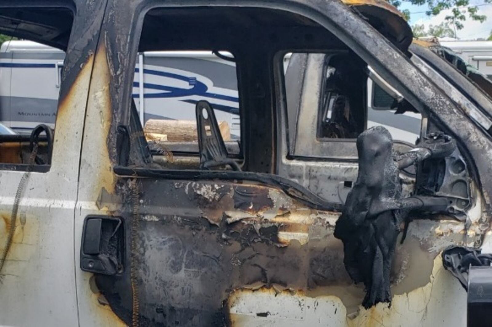 A neighbor has created a GoFundMe page for her neighbor, Charles Crawford, Jr., whose work truck was set on fire. The fire spread to a second vehicle he owned. PROVIDED