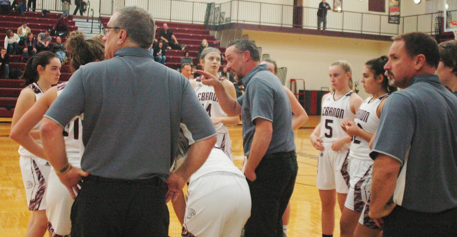 Lebanon coach Rob Hodges makes a point to his team during a timeout Monday night at LHS. Visiting Hamilton earned a 52-42 victory. RICK CASSANO/STAFF