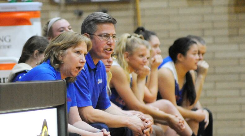 Carroll girls coach Cecilia Grosselin (left) and assistant Mike Austria have led the Patriots to a 15-0 season and the No. 1 ranking in D-II. MARC PENDLETON / STAFF