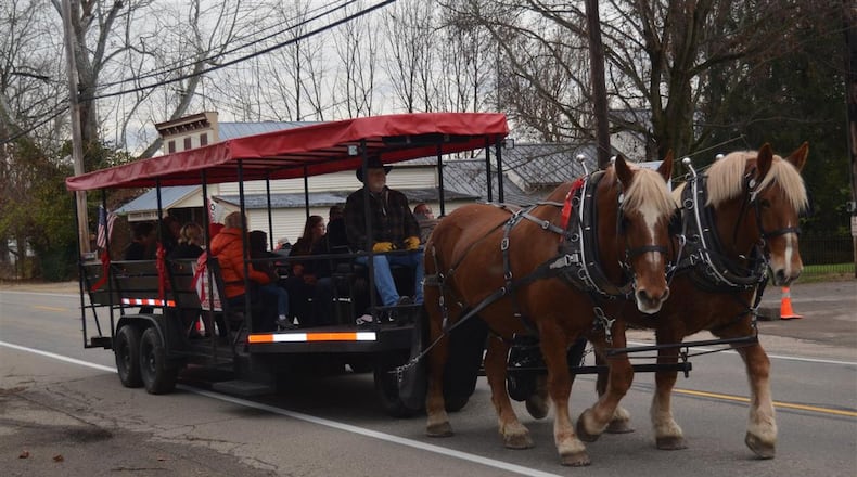 A horse-drawn carriage travels through Shandon as part of the village’s annual Christmas in the Country event. CONTRIBUTED